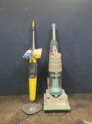 A DYSON DC01 UPRIGHT VACUUM CLEANER, along with a Silvercrest steam mop (both PAT pass and