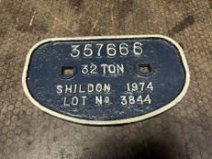 A VINTAGE CAST IRON COAL WAGON NAME PLATE, 11in across (overpainted in blue and white)