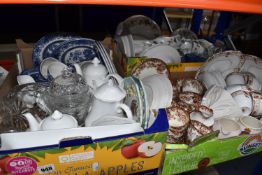 THREE BOXES OF CERAMICS AND GLASS WARES, to include willow pattern dinnerware, approximately forty