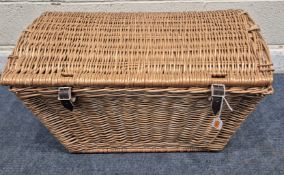 A DOMED WICKER BASKET, with a hinged lid and twin handles, width 77cm x depth 55cm x height 45cm,