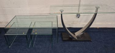 A GLASS CONSOLE TABLE, width 123cm x depth 46cm x height 77cm, along with a nest of three tables,
