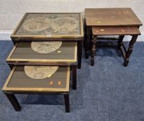 A NEST OF THREE TABLES, with brass banding and map inserts, largest table width 64cm x depth 46cm