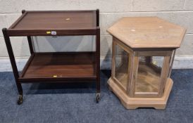 A MID-CENTURY TEAK TWO TIER TROLLEY, each tier with a double sided removable tray, width 67cm x