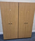 A PAIR OF 20TH CENTURY TEAK EFFECT DOUBLE DOOR WARDROBES, width 77cm x depth 53cm x height 184cm,
