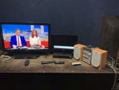 A COLLECTION OF AUDIO VISUAL EQUIPMENT, comprising a Philips 32PFL5605H 32in TV with remote, a