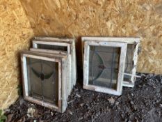 TEN LEADED WINDOWS, in wooden frames, the largest being 55cm x 52cm (10)