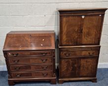 BRADLEY, A REPRODUCTION MAHOGANY CABINET, with four cupboard doors, a brushing slide and a single