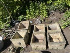 SIX SQUARE CONCRETE PLANTERS, including a pair with lion mask handles, 36cm across, and two pairs