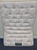 A PINK AND FLORAL 4FT6 MATTRESS, condition report: label damaged, general signs of usage