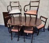 A REPRODUCTION MAHOGANY TWIN PEDESTAL TILT TOP DINING TABLE, with one additional leaf, extended