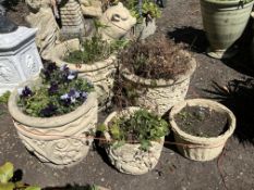 FIVE CONCRETE PLANT POTS OF VARIOUS SIZES AND STYLE, the largest being 39cm high (5)