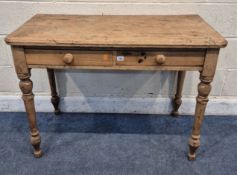 A 19TH CENTURY PINE SIDE TABLE, fitted with two frieze drawers, raised on turned legs, width 107cm x