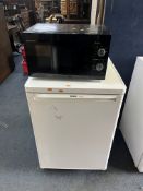 A BOSCH UNDER-COUNTER ICE BOX FRIDGE, width 55cm, depth 61cm, height 85cm and a Sharp microwave (