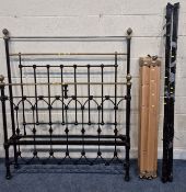 A CAST IRON AND BRASS 4FT4 BEDSTEAD, with side rails and slats, condition report: siderails bent,