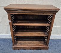 A HARDWOOD OPEN BOOKCASE, width to fixed shelves and pierced sides, width 83cm x depth 36cm x height
