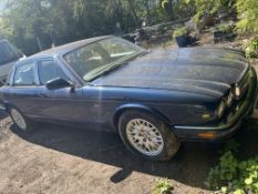 A 2000 JAGUAR XJ8 FOUR DOOR SALOON CAR, in metallic blue, with a 3248cc V8 petrol engine,