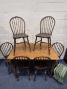 AN EARLY 20TH CENTURY OAK TABLE, raised on shaped legs, width 122cm x depth 92cm x height 78cm,