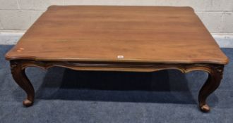 A LARGE HARDWOOD RECTANGULAR COFFEE TABLE, raised on cabriole legs, width 137cm x depth 92cm x