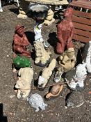 FOURTEEN CONCRETE GARDEN FIGURES, mostly in the form of animals, including cats, frogs, badgers,