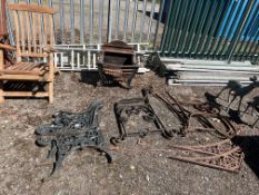 A COLLECTION OF METALWARE, including a fire basket, two sets of wrought iron bench ends, a set of