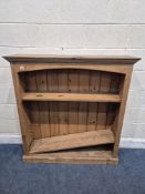 A PINE OPEN BOOKCASE, with two adjustable shelves, width 107cm x depth 31cm x height 123cm,