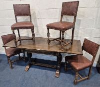 AN EARLY 20TH CENTURY OAK DRAW LEAF DINING TABLE, raised on carved bulbous legs, united by a