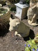 A CONCRETE FIGURE OF A SEATED PIG, 45cm high