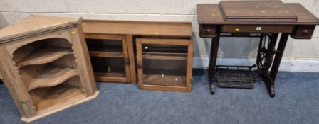 AN OAK CASED TREADLE SINGER SEWING MACHINE, width 88cm x depth 42cm x height 79cm, a double glass
