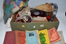 ONE BOX OF MAGIC/ILLUSION RELATED ITEMS to include fourteen 'how to' books, the metal rings trick,