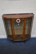 AN EARLY 20TH CENTURY WALNUT CHINA CABINET, with chinoiserie details, a small clock inlaid to the