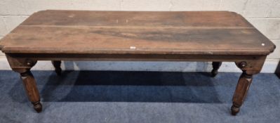 A PITCH PINE RECTANGULAR TABLE, raised on block and turned legs, length 184cm x depth 71cm x