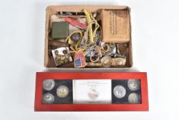 AN ASSORTMENT OF MILITARY COLLECTABLES, to include cloth patches, whistles, a coin set and other