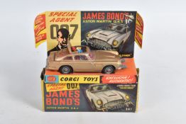 A BOXED CORGI TOYS JAMES BOND ASTON MARTIN D.B.5. No.261, working roof but other features not