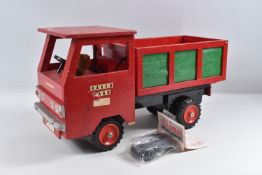 A SCRATCHBUILT WOODEN TIPPER LORRY, red cab, black chassis, red and green tipping body, plastic