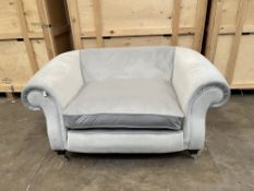 A LIGHT GREY CRUSHED VELVET EFFECT THREE PIECE LOUNGE SUITE, on square black legs and chrome casters