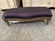 A LATE 20TH CENTURY INDIAN / ASIAN STYLE GILT WOOD SERPENTINE FOOTSTOOL, length 126cm x depth 50cm x