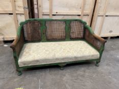 AN EARLY TO MID 20TH CENTURY GREEN LACQUERED BERGERE SOFA, with Japanned chinoiserie decoration,