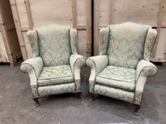 A PAIR OF EARLY 20TH CENTURY GEORGIAN STYLE WING BACK ARMCHAIRS, on pad feet, width 89cm x width