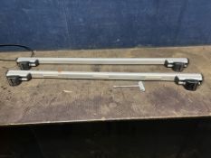 A PAIR OF BMW E53 ALUMINIUM ROOF BARS with key, both 126cm long (key stored elsewhere for