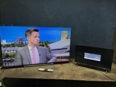A TOSHIBA 49U586UDB 49in SMART TV with remote and a JVC 24in TV Smart LED TV with NO remote (both
