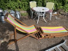 A SET OF FOUR MODERN HARDWOOD DECK CHAIRS, all with pastel striped fabrics (4)