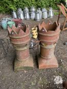 A PAIR OF TERRACOTTA 'CROWN' CHIMNEY POTS, 75cm high, Condition Report: one spike missing (2)