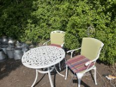A CAST ALUMINIUM GARDEN TABLE WITH TWO SIMILAR CHAIRS, all have pierced fretwork detail, table,