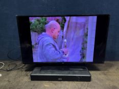 A BUSH DLED40FHDS 40in SMART TV, with remote and a Denon DHT-T100 soundbar (spares or repairs) (both