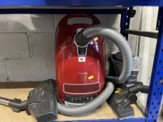 A MIELE C3 CAT & DOG VACUUM CLEANER, with three floor heads and a partially full box of bags (PAT