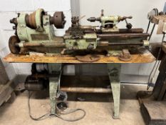 A VINTAGE BANTAM ENGINEERING LATHE ON STAND, total length 142cm, motor, switch without cover, 3
