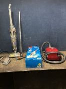 A HOOVER TELIOS 1700 VACUUM CLEANER, with floor head (PAT pass and working), a Dirt Devil steam