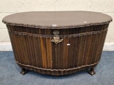 A HARDWOOD SERPENTINE KIST / BLANKET CHEST, the hinged lid enclosing two trays, raised on cabriole