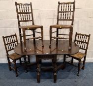 A 20TH CENTURY OAK GATE LEG TABLE, raised on block and turned legs, united by stretchers, open width