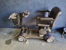 A GOGO MOBILITY SCOOTER (SPARES OR REPAIRS) with key, charger, cover and control rain cover (charger